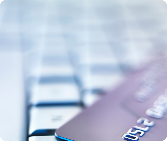 Business credit card on laptop keyboard